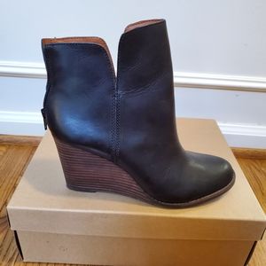 Black leather wedge booties